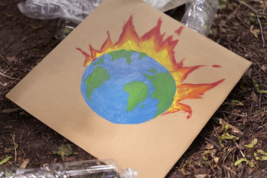foto de desenho mostrando o planeta pegando fogo, remete ao artigo COP30 e a Construção de Consensos Climáticos: o papel estratégico das relações institucionais e governamentais (RIG)