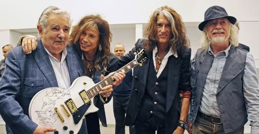 foto de pepe mujica com o grupo aerosmith